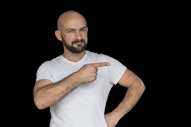 plešatý muž